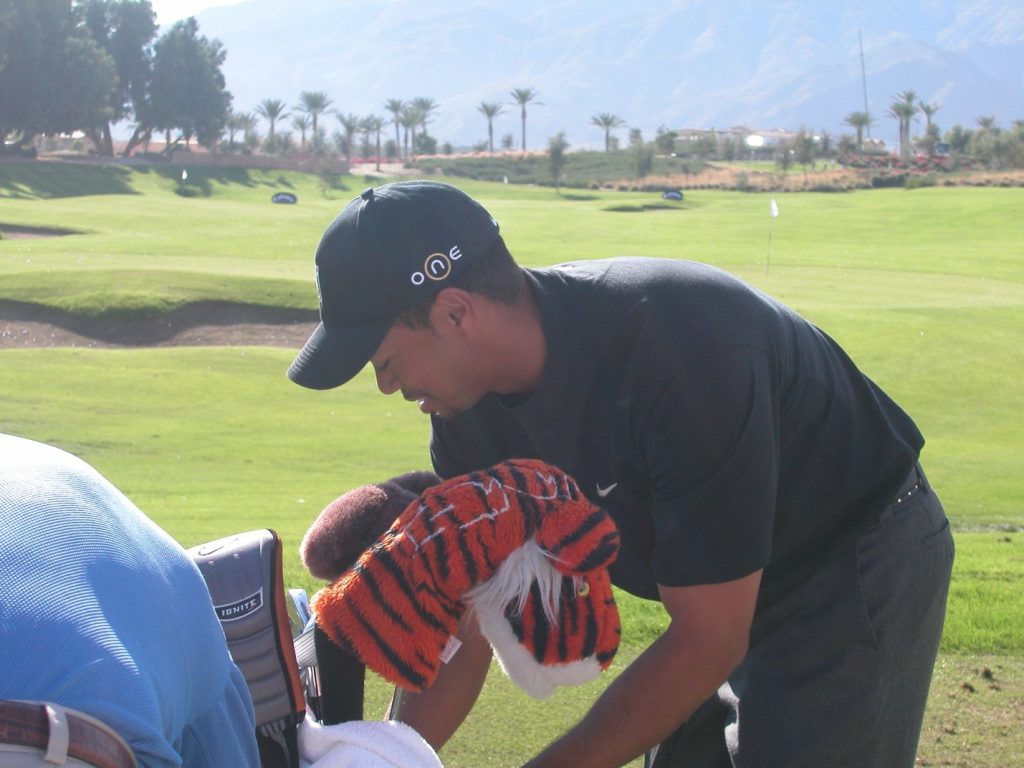 Tiger has already counted his clubs and is now checking on his snack supply to make sure everything he likes is on board.