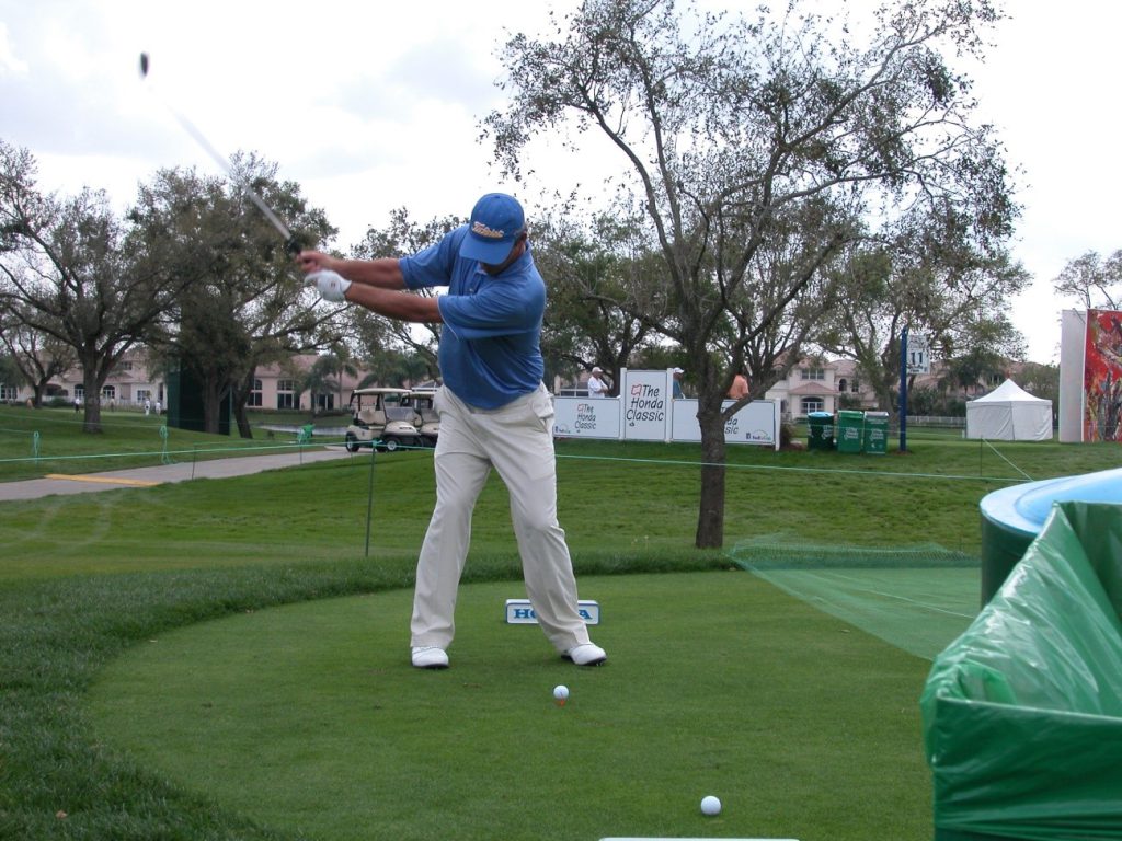 golfer swinging the golf club